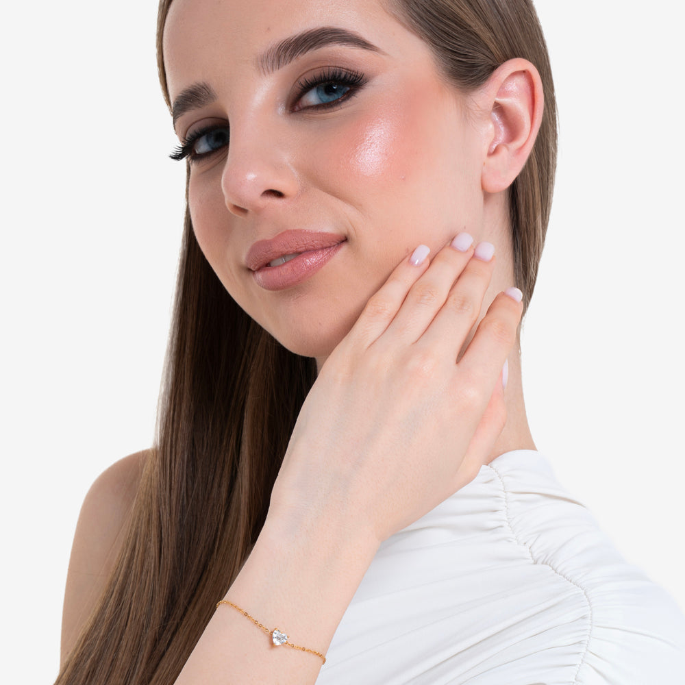 BRACCIALE DONNA IN ACCIAIO E IP GOLD CON CUORE CRISTALLO BIANCO