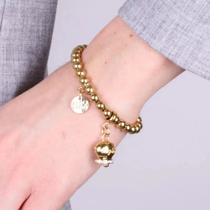 Bracciale in Acciaio con campanella placcata oro con scritta Capri
