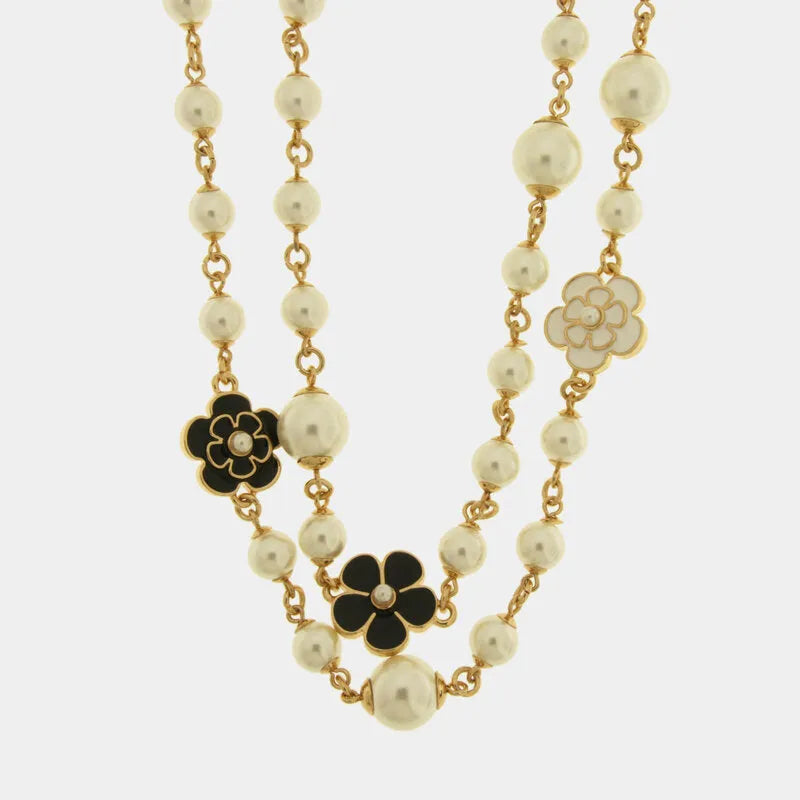 Collana in Metallo multifilo con sfere perlate e fiori smaltati bianchi e neri